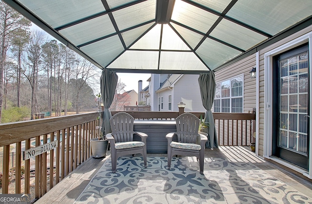 wooden terrace with a gazebo