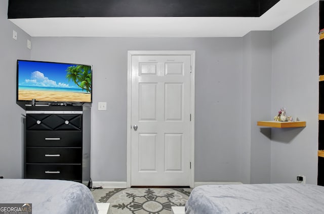 bedroom with baseboards