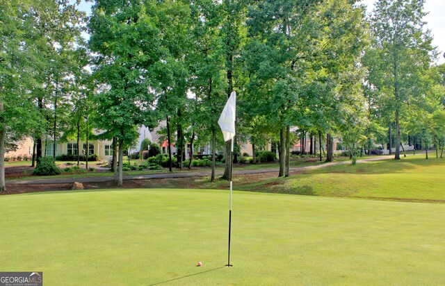 view of home's community featuring a yard