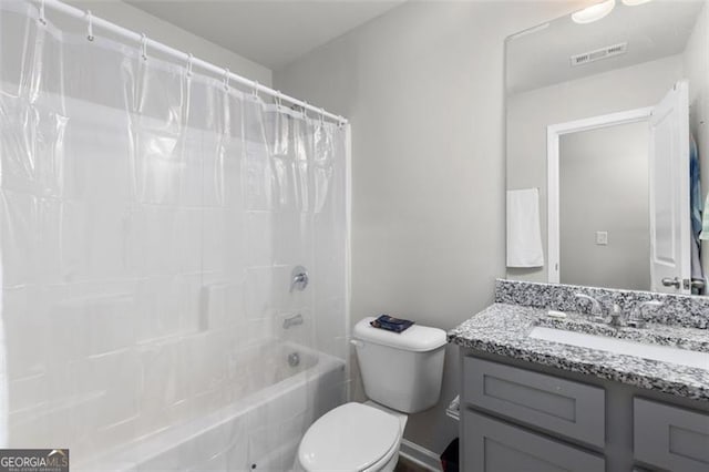 full bathroom featuring visible vents, toilet, vanity, and shower / bath combination with curtain