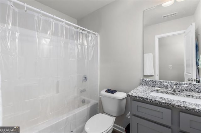 full bathroom with visible vents, toilet, vanity, and shower / bath combination with curtain