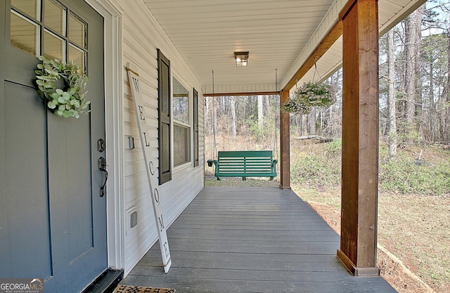 deck featuring covered porch