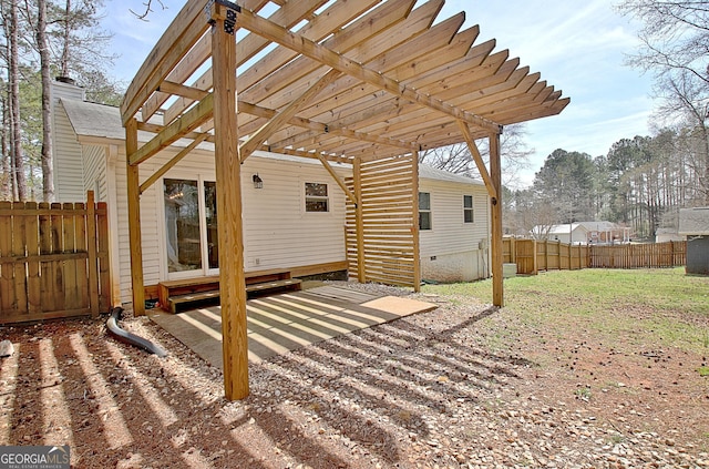 exterior space featuring a yard, a patio, a pergola, and fence