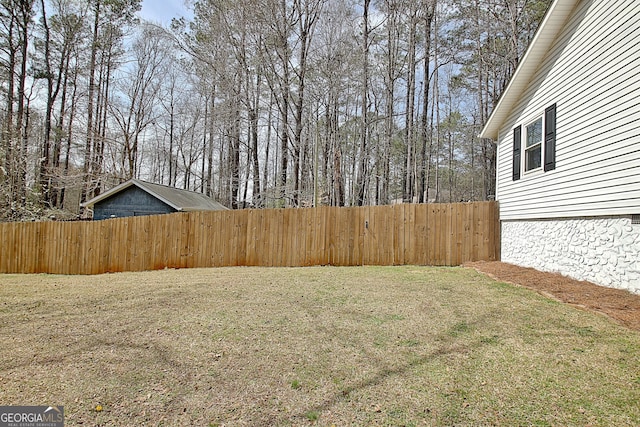 view of yard featuring fence