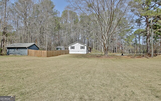 view of yard featuring fence