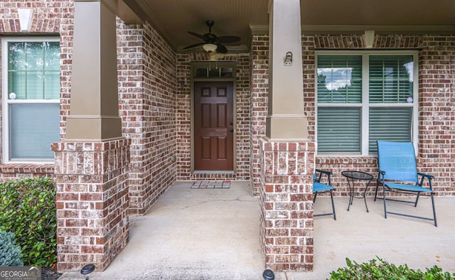 5310 Corinth Ct, Cumming, GA 30040 - property entrance with brick siding, ceiling fan, and covered porch