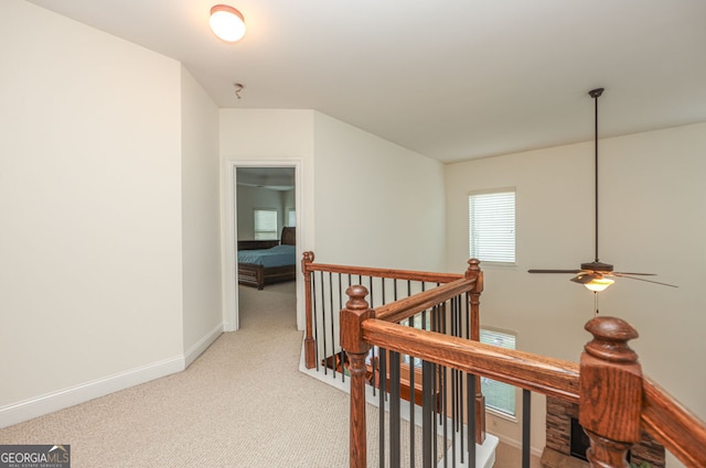 5310 Corinth Ct, Cumming, GA 30040 - corridor featuring light carpet, an upstairs landing, and baseboards