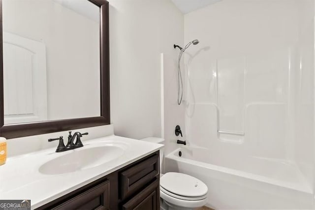 5310 Corinth Ct, Cumming, GA 30040 - bathroom with toilet, vanity, and tub / shower combination