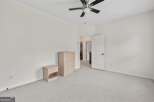 5310 Corinth Ct, Cumming, GA 30040 - unfurnished bedroom featuring carpet, baseboards, and a ceiling fan