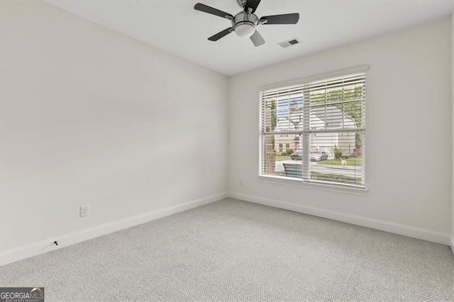 5310 Corinth Ct, Cumming, GA 30040 - spare room with visible vents, baseboards, ceiling fan, and light colored carpet