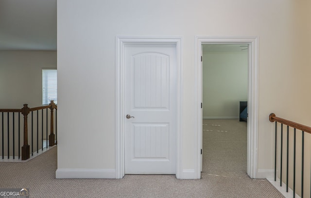 5310 Corinth Ct, Cumming, GA 30040 - hall featuring baseboards, an upstairs landing, and carpet flooring