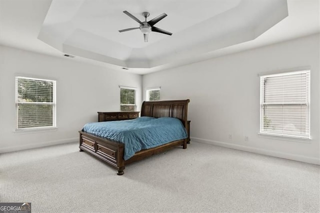 5310 Corinth Ct, Cumming, GA 30040 - bedroom featuring baseboards, a raised ceiling, carpet flooring, and a ceiling fan
