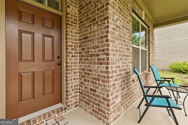 5310 Corinth Ct, Cumming, GA 30040 - doorway to property with a porch and brick siding