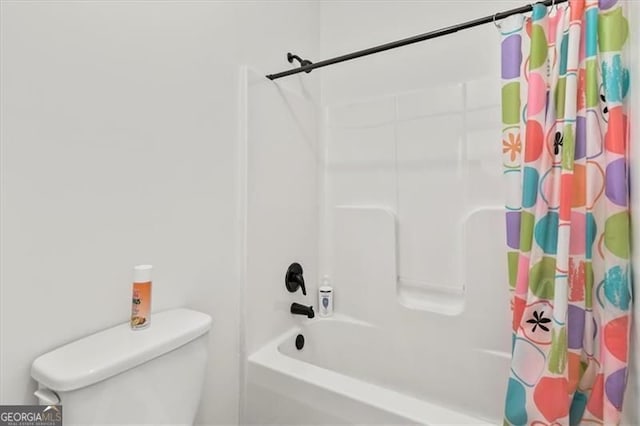 5310 Corinth Ct, Cumming, GA 30040 - bathroom with shower / bathtub combination with curtain and toilet