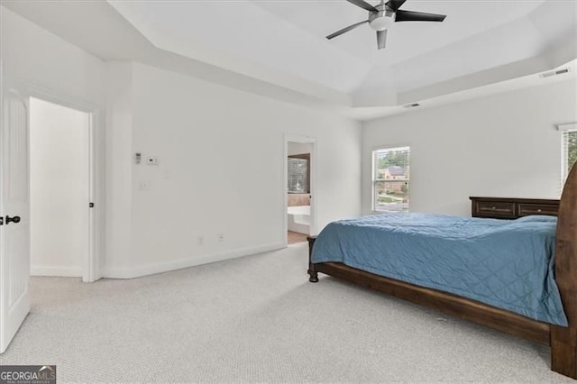 5310 Corinth Ct, Cumming, GA 30040 - carpeted bedroom with baseboards, a ceiling fan, connected bathroom, visible vents, and a raised ceiling
