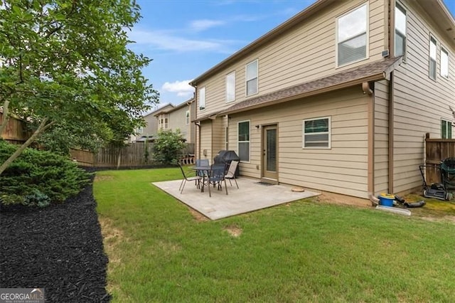 5310 Corinth Ct, Cumming, GA 30040 - back of property featuring a yard, a fenced backyard, and a patio area
