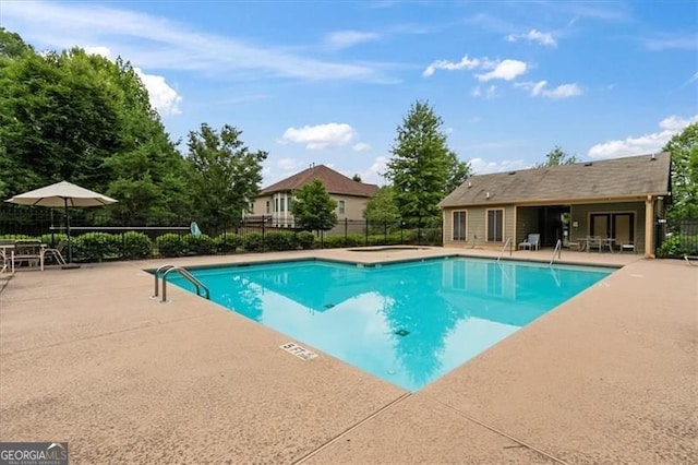 5310 Corinth Ct, Cumming, GA 30040 - pool with a patio area, fence, and an outbuilding