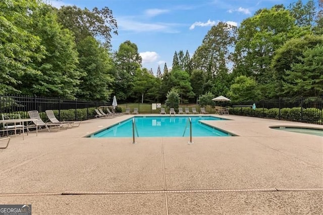 5310 Corinth Ct, Cumming, GA 30040 - community pool featuring a patio area and fence