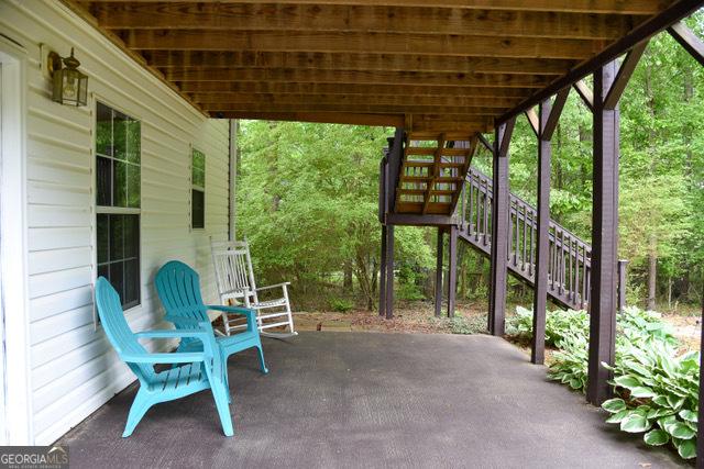 332 Black Willow Ct, Locust Grove, GA 30248 - view of patio with stairway
