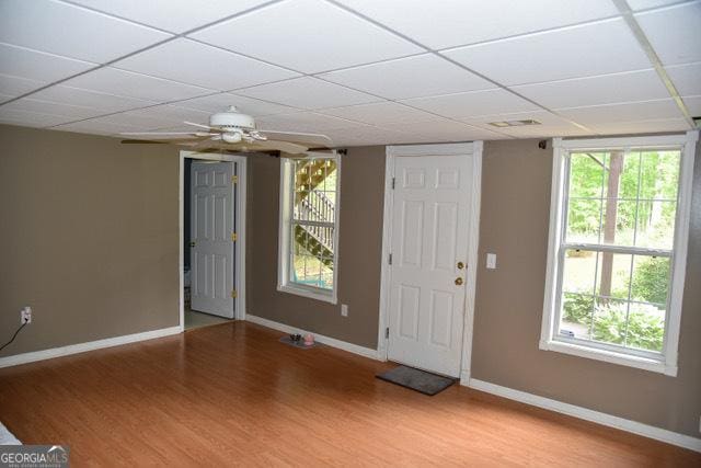 332 Black Willow Ct, Locust Grove, GA 30248 - entrance foyer featuring baseboards, wood finished floors, a ceiling fan, and a paneled ceiling