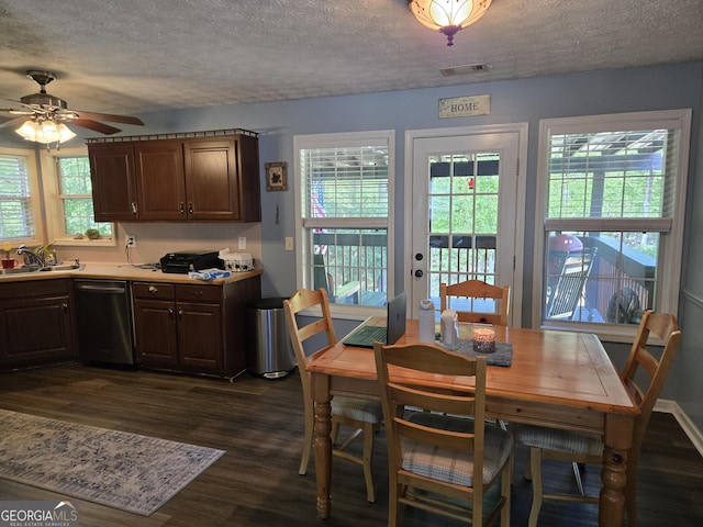 332 Black Willow Ct, Locust Grove, GA 30248 - dining area with a textured ceiling, dark wood-style flooring, healthy amount of natural light, and ceiling fan