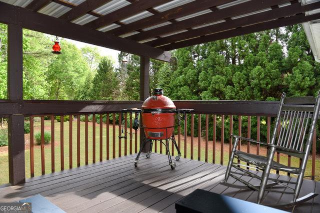 332 Black Willow Ct, Locust Grove, GA 30248 - view of wooden terrace