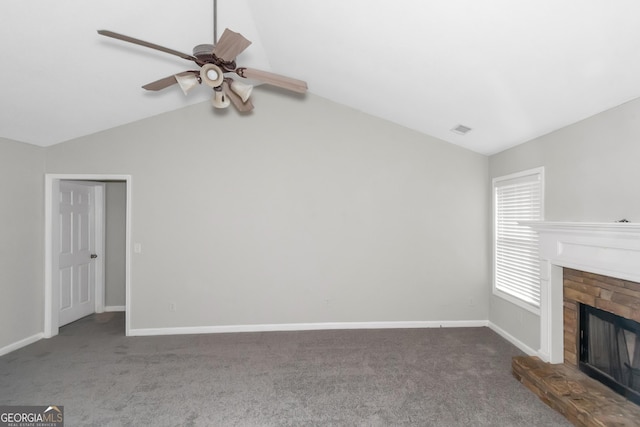 75 Heatherstone Way, Covington, GA 30016 - unfurnished living room featuring lofted ceiling, a ceiling fan, carpet floors, and a fireplace