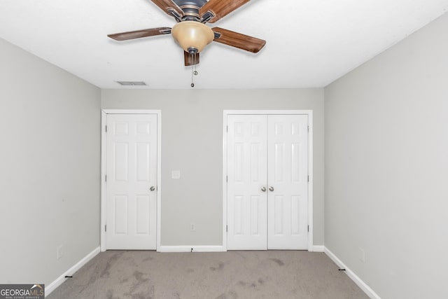 75 Heatherstone Way, Covington, GA 30016 - unfurnished bedroom featuring carpet flooring, a closet, and ceiling fan