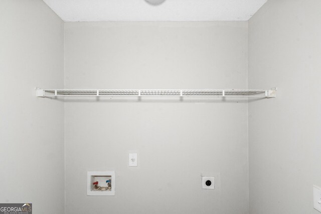 75 Heatherstone Way, Covington, GA 30016 - laundry room featuring hookup for an electric dryer and washer hookup