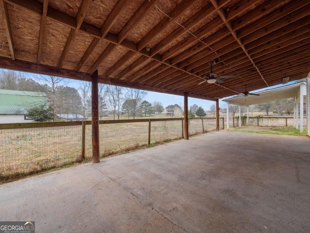 view of patio with a rural view and a ceiling fan