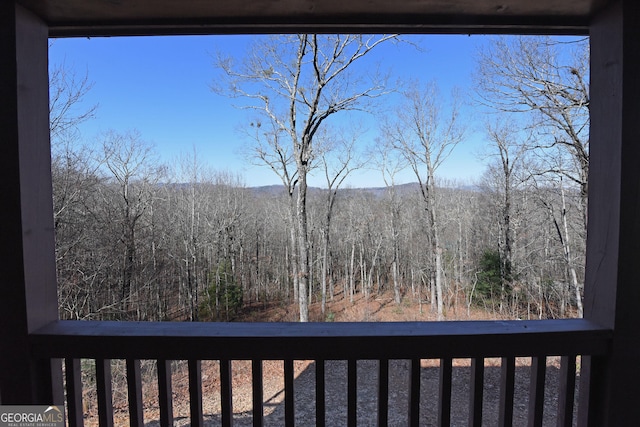 balcony with a wooded view