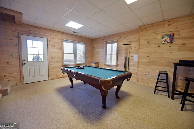 recreation room with a drop ceiling, carpet floors, wood walls, and pool table