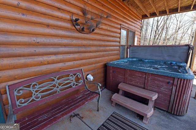 view of patio / terrace featuring a hot tub