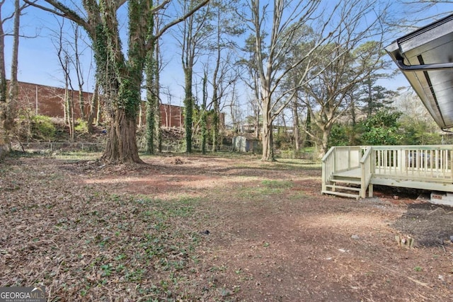 view of yard featuring a deck