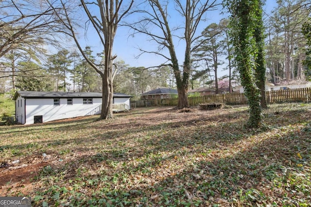 view of yard with fence