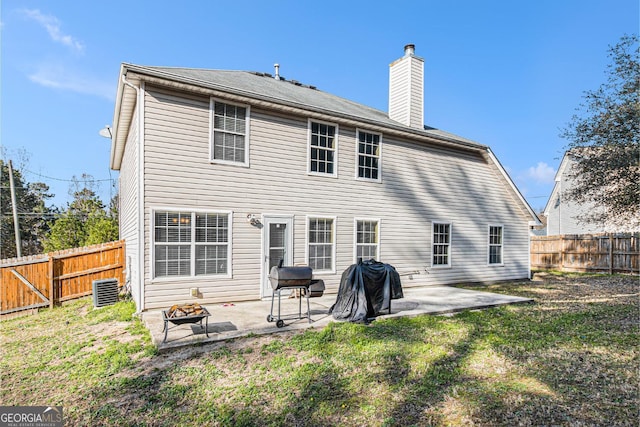 1921 Boulder Gate Dr, Ellenwood, GA 30294 - back of property featuring a patio area, a fenced backyard, and a yard