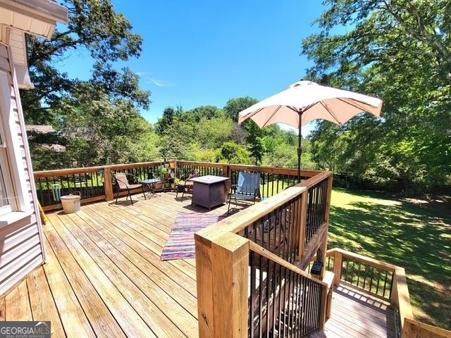 345 Lambeth Dr, Hiram, GA 30141 - bedroom with carpet floors, lofted ceiling, a textured ceiling, and a ceiling fan