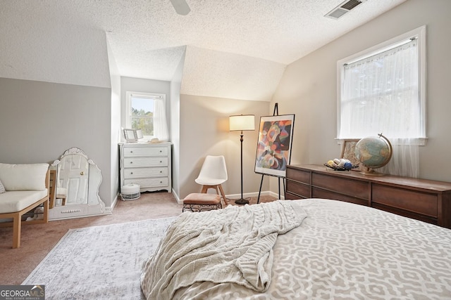 345 Lambeth Dr, Hiram, GA 30141 - bedroom featuring vaulted ceiling, carpet floors, a textured ceiling, baseboards, and ceiling fan