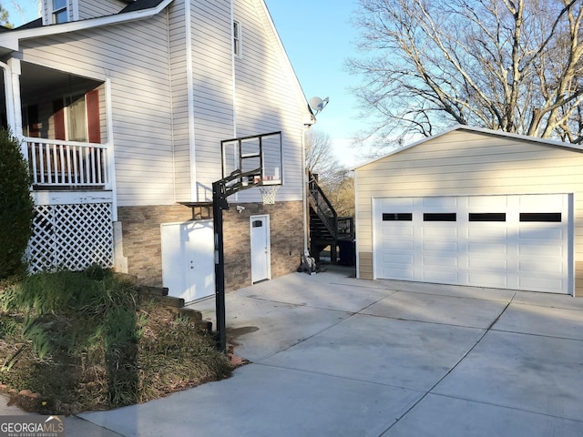 345 Lambeth Dr, Hiram, GA 30141 - view of side of property featuring a garage and an outbuilding