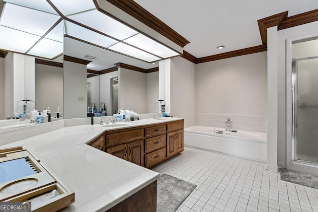 full bath with a shower stall, a garden tub, double vanity, and tile patterned floors