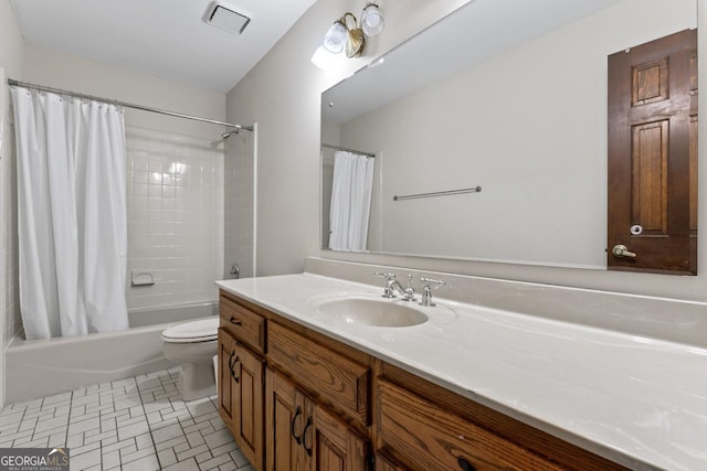 full bathroom featuring visible vents, toilet, shower / bath combo, tile patterned floors, and vanity