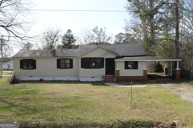 view of front of property with an attached carport, roof with shingles, entry steps, a front lawn, and crawl space