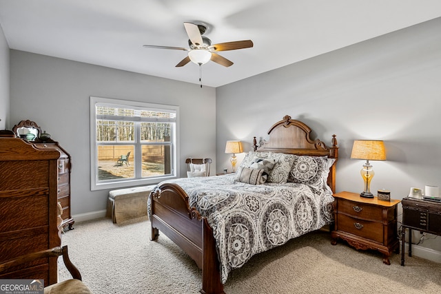 bedroom featuring baseboards, carpet floors, and ceiling fan