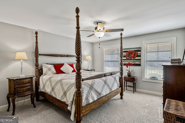 bedroom with baseboards, carpet, and a ceiling fan