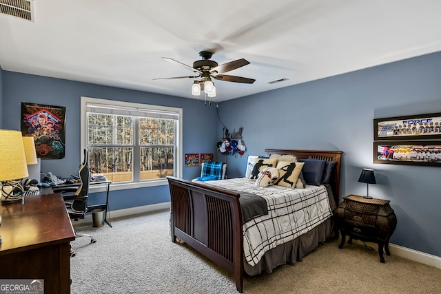 bedroom featuring visible vents, baseboards, and carpet