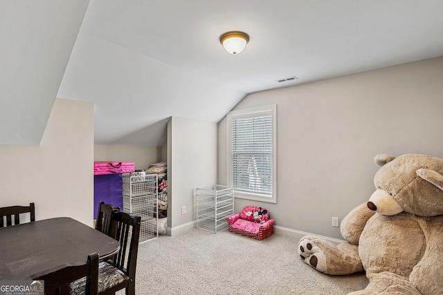 rec room featuring visible vents, carpet floors, baseboards, and vaulted ceiling