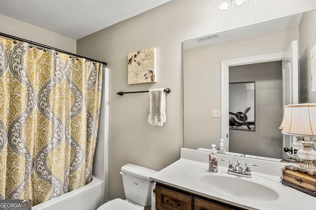 full bath featuring visible vents, shower / bath combination with curtain, toilet, and vanity