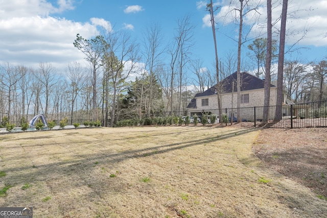 view of yard featuring fence