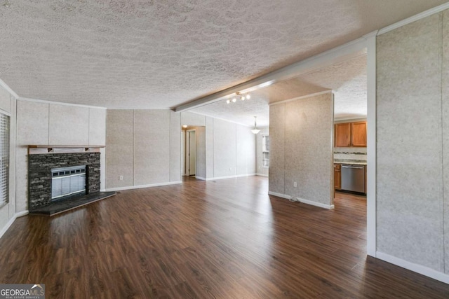 unfurnished living room featuring vaulted ceiling with beams, baseboards, a fireplace, dark wood-style floors, and a textured ceiling