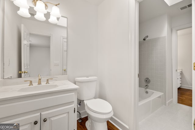 full bath with vanity, visible vents, baseboards, bathtub / shower combination, and toilet